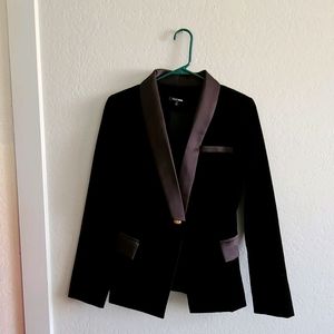 Womens blazer and biker shorts suit.